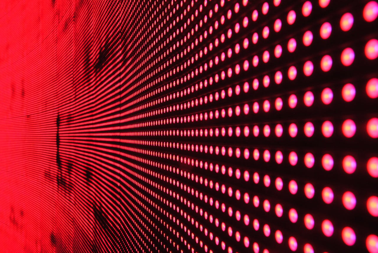 Mastering the First Impression: Your intriguing post title goes here Vibrant abstract pattern of illuminated red LED lights forming a dynamic design.